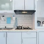 Best Comfy And Modern 2Br Green Pramuka Apartment By Travelio