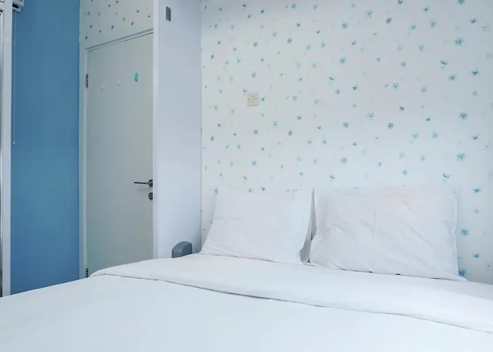 Best Comfy And Modern 2Br Green Pramuka Apartment By Travelio